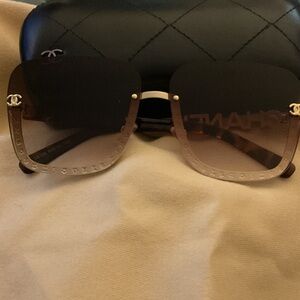 CHANEL Black and Gold Rimless Sunglasses
